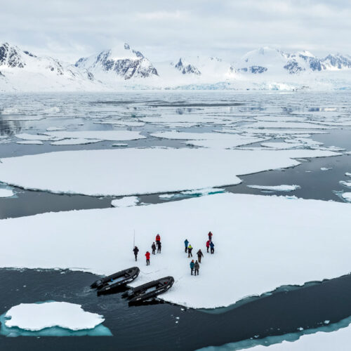 Guests on fast ice in the fjords of Svalbard photo tour